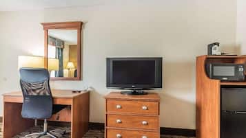 Desk, laptop workspace, blackout drapes, iron/ironing board