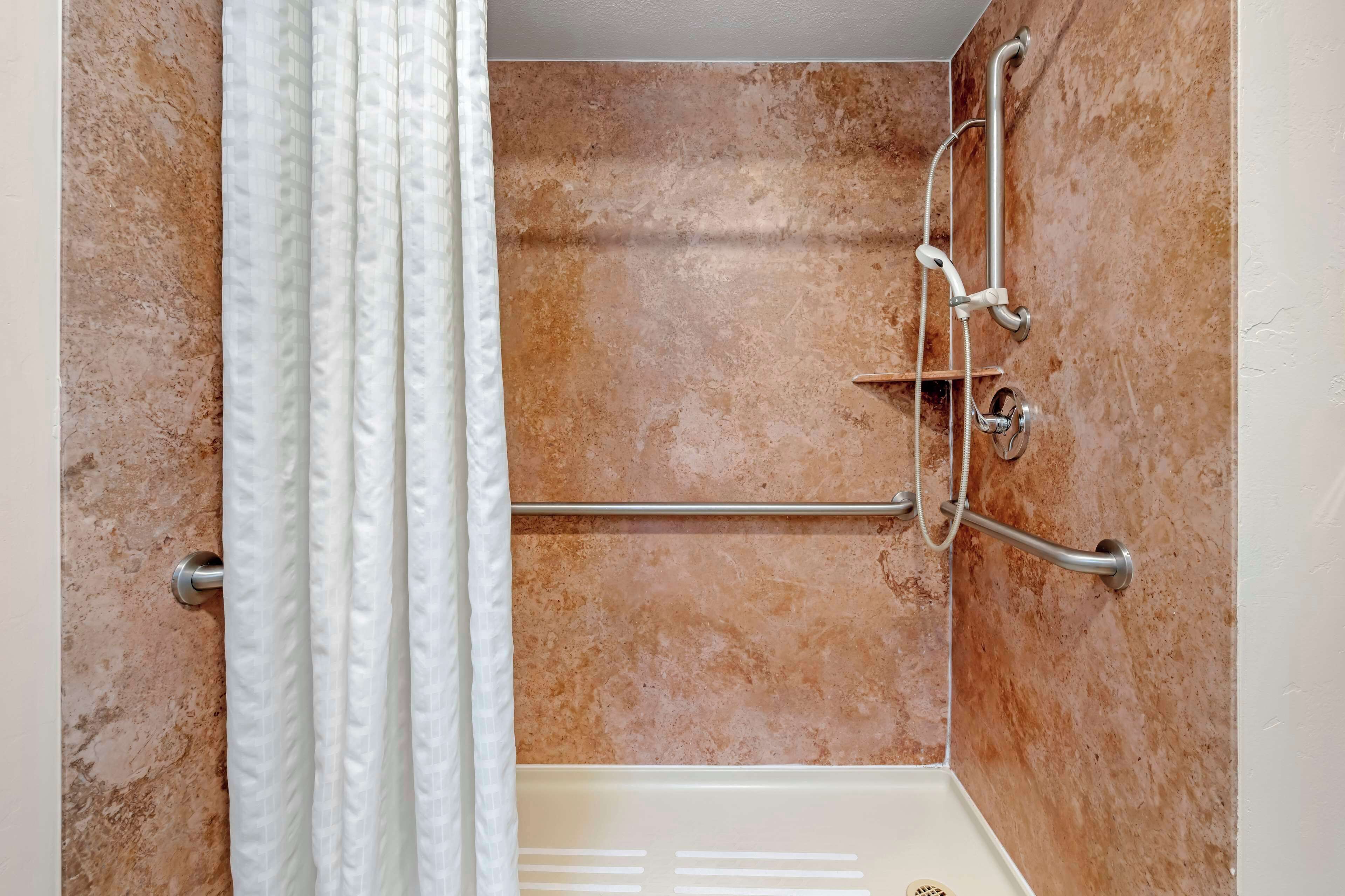 standard room, 2 queen beds, accessible, refrigerator & microwave | bathroom | combined shower/bathtub, free toiletries, hair dryer, towels