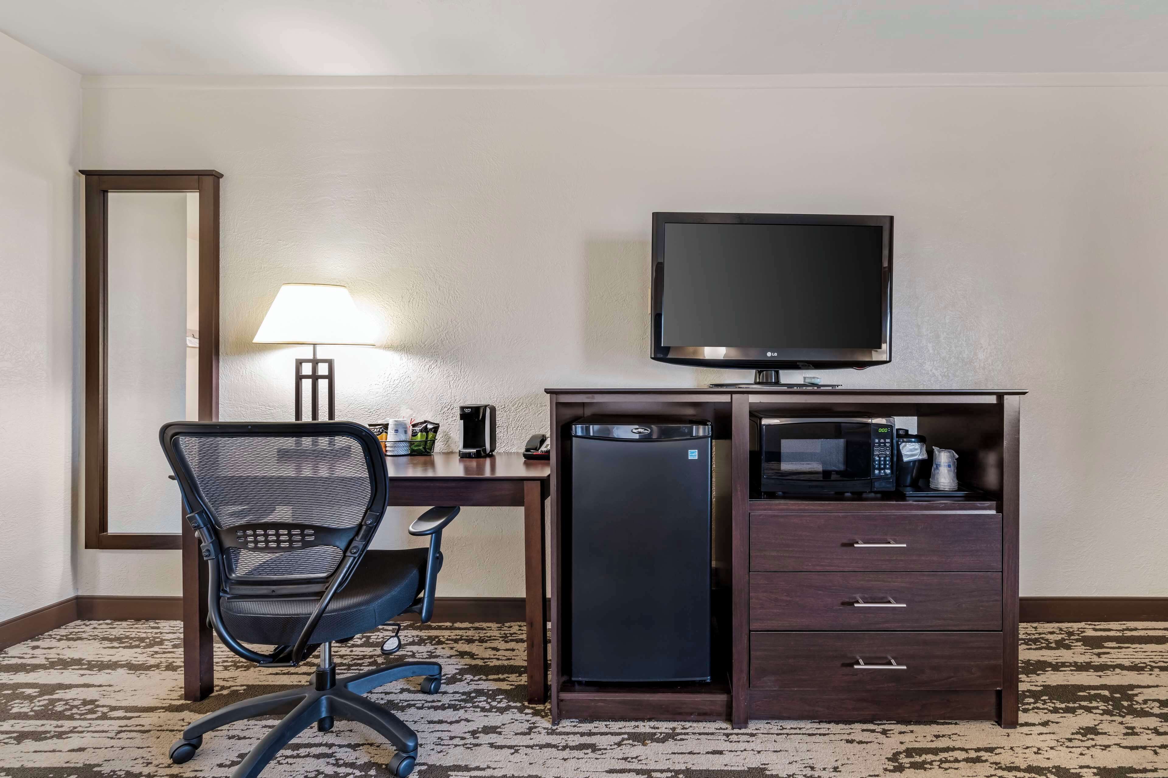 standard room, 1 king bed, non smoking, refrigerator & microwave (larger room) | in-room safe, desk, laptop workspace, blackout curtains