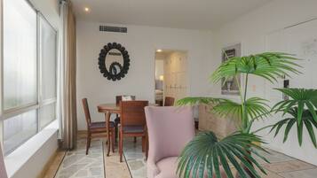 1 King Bed, 1 Queen Bed, 2 Bedroom Suite | Living area | 40-inch flat-screen TV with cable channels, TV, heated floors