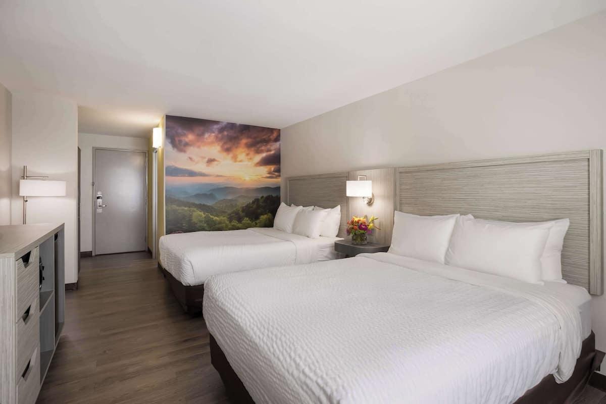Standard Room, 2 Queen Beds, Non Smoking | In-room safe, blackout drapes, iron/ironing board, rollaway beds