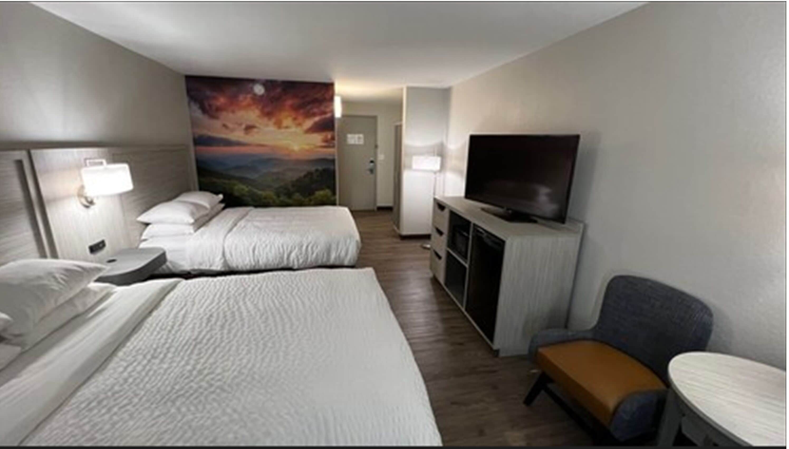 standard room, 2 queen beds, non smoking | in-room safe, blackout curtains, iron/ironing board, rollaway beds