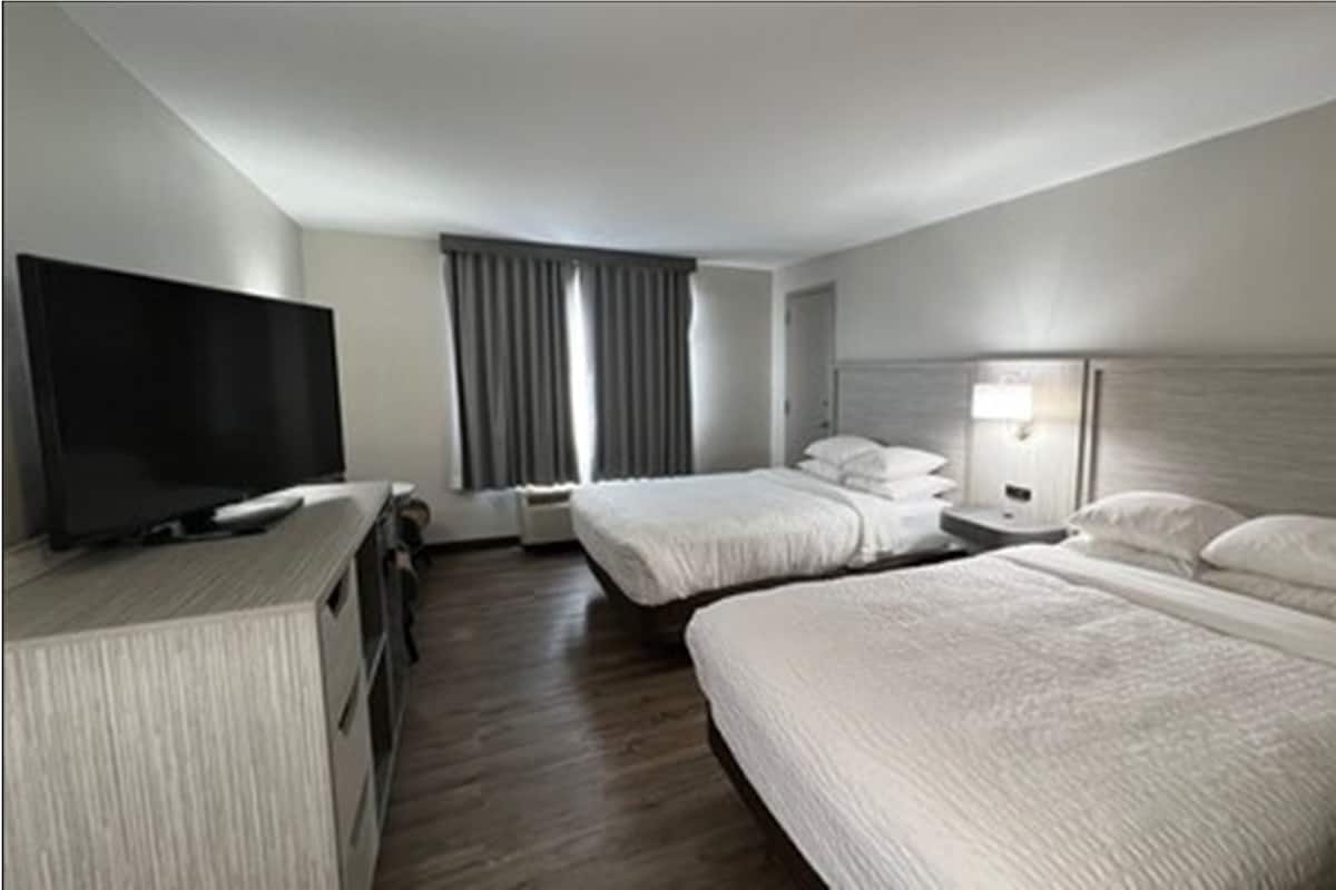 standard room, 2 queen beds, non smoking | in-room safe, blackout curtains, iron/ironing board, rollaway beds