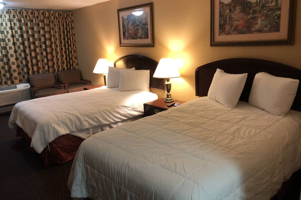 Desk, blackout drapes, WiFi (free), bed sheets