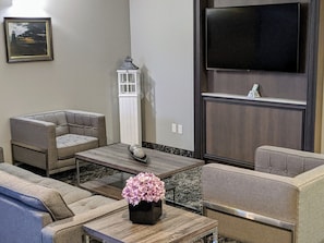 Deluxe Suite, 1 King Bed, Non Smoking | Living area | TV