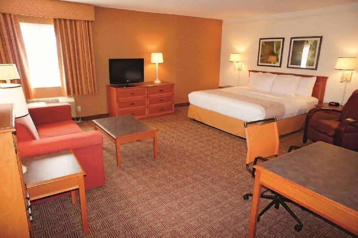 Premium bedding, desk, blackout curtains, iron/ironing board