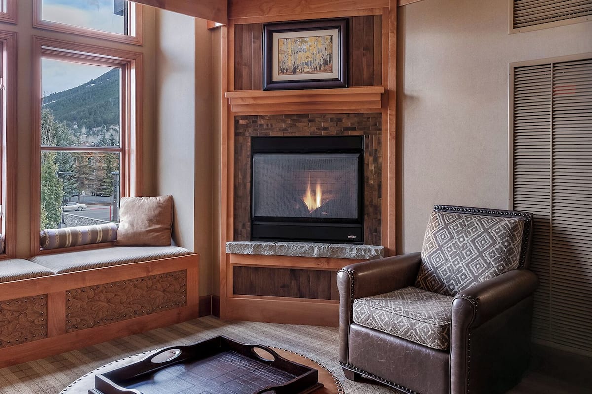 deluxe room, 1 king bed, fireplace (premium king fireplace with sofa slee) | egyptian cotton sheets, premium bedding, down duvets