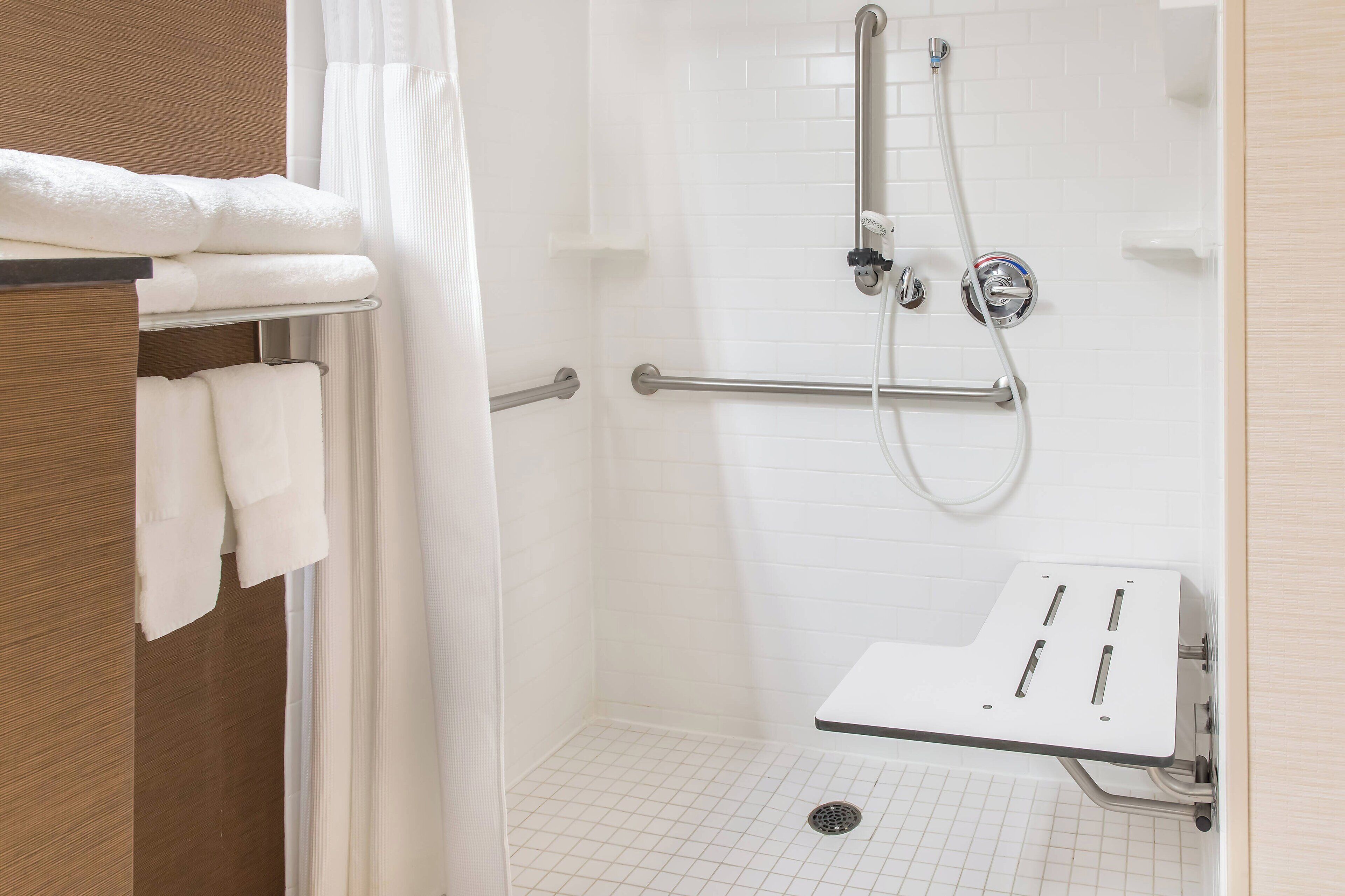 combined shower/bathtub, free toiletries, hair dryer, towels