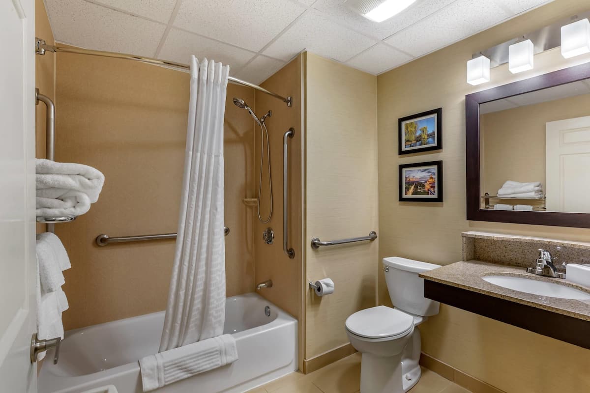 Desk, blackout curtains, iron/ironing board, rollaway beds