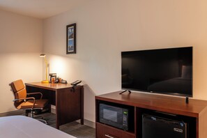 Desk, blackout curtains, iron/ironing board, rollaway beds