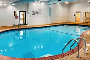 Indoor pool, open 7 AM to 11 PM, sun loungers