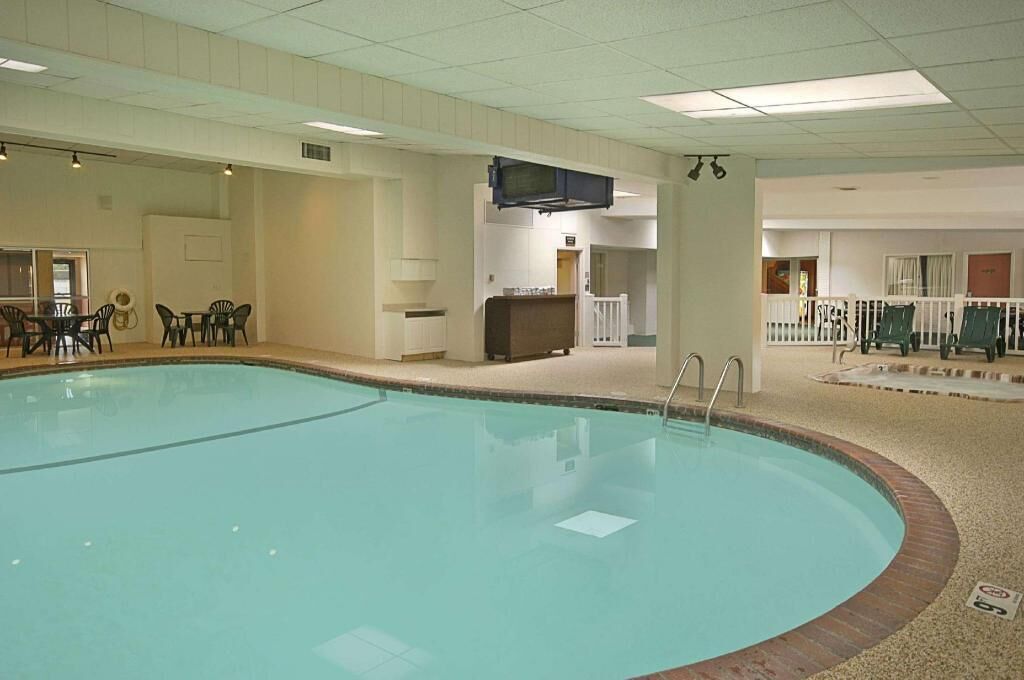 Indoor pool, open 7 AM to 11 PM, sun loungers