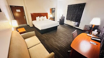 Suite, 1 King Bed with Sofa bed, Non Smoking | Desk, laptop workspace, iron/ironing board, free cribs/infant beds