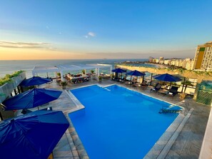 Outdoor pool, pool umbrellas, pool loungers