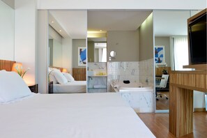 Junior Suite, Beachside | Minibar, in-room safe, desk, soundproofing