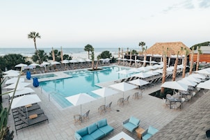 Outdoor pool, open 8:00 AM to midnight, pool umbrellas, pool loungers