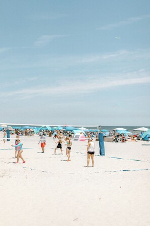 On the beach, white sand, beach volleyball, beach bar