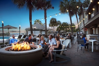 Outdoor pool, open 8:00 AM to midnight, pool umbrellas, sun loungers at Beach House Resort Hilton Head