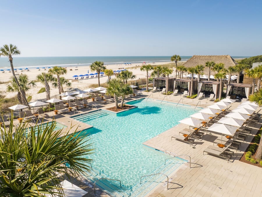 Outdoor pool, open 8:00 AM to midnight, pool umbrellas, pool loungers