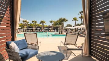 Outdoor pool, open 8:00 AM to midnight, pool umbrellas, sun loungers
