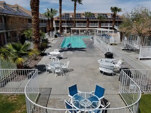 Outdoor pool, pool umbrellas, pool loungers