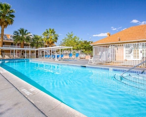 Outdoor pool, pool umbrellas, sun loungers