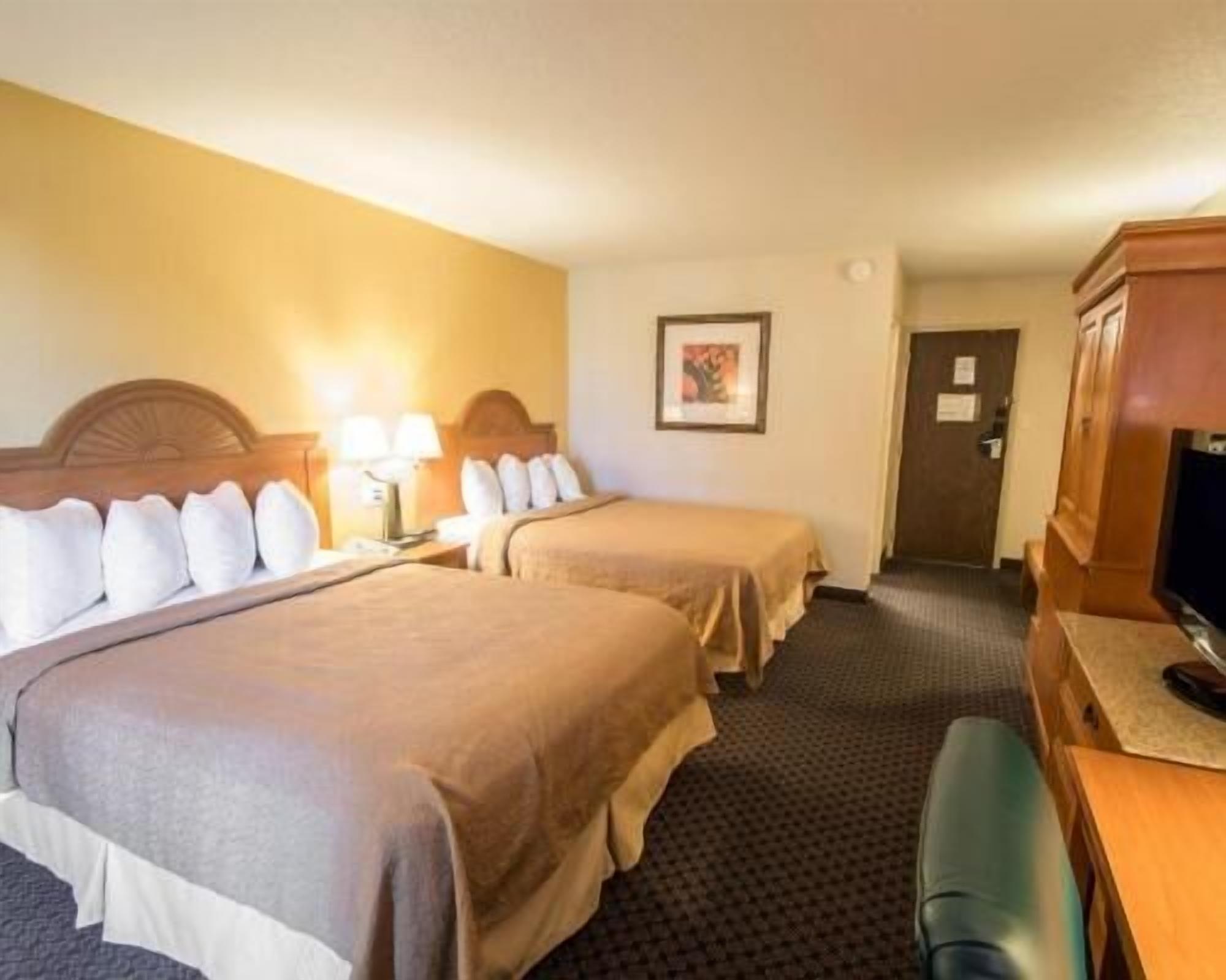 Premium bedding, down comforters, pillowtop beds, desk