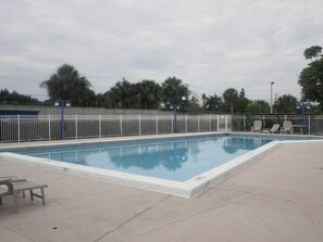 Outdoor pool, open 8:00 AM to 8:00 PM, pool loungers