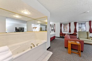 Suite, 1 King Bed, Non Smoking | In-room safe, desk, blackout drapes, iron/ironing board