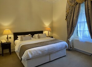 Superior Suite, 1 King Bed | Desk, blackout drapes, iron/ironing board, cribs/infant beds