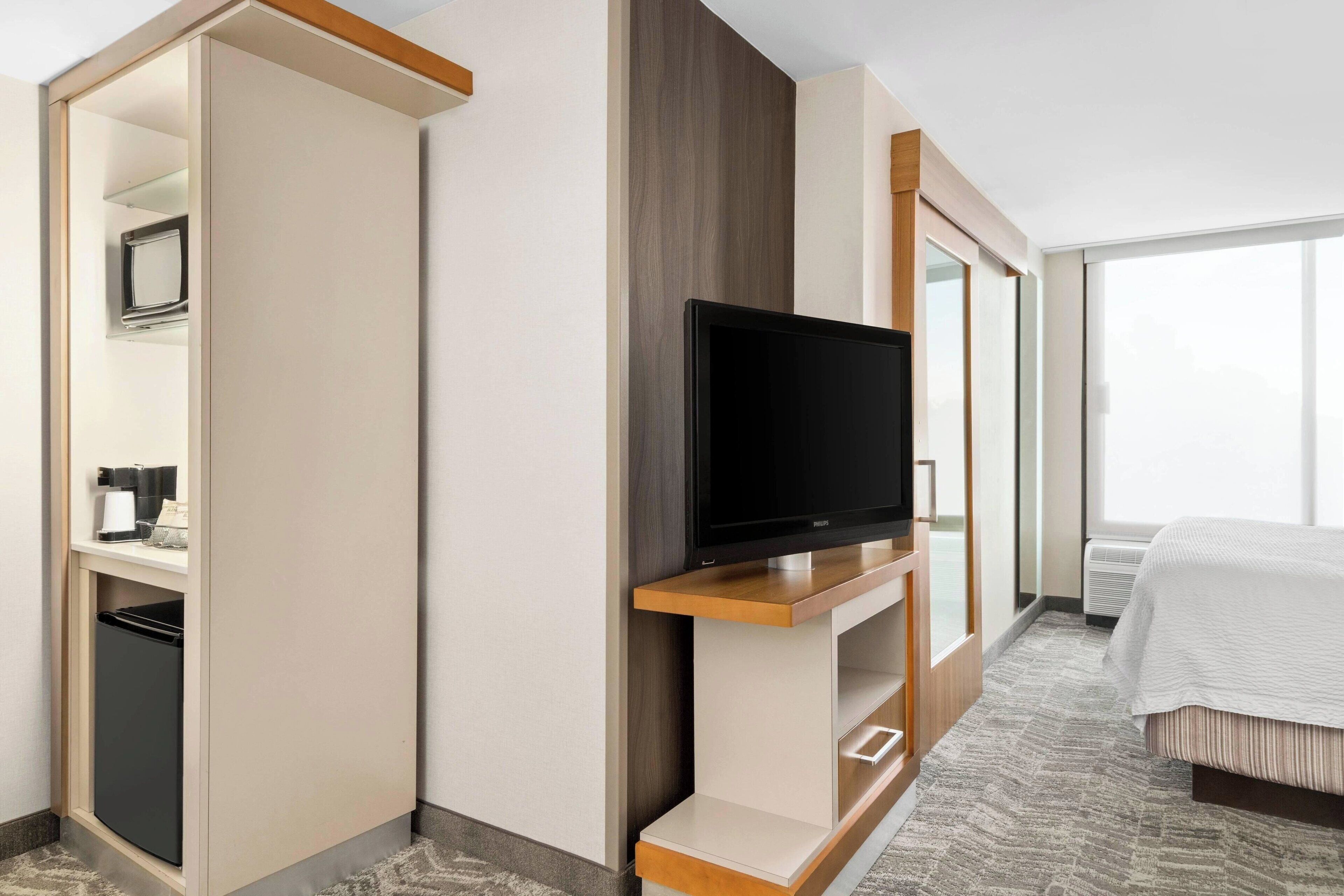 premium bedding, desk, blackout curtains, iron/ironing board