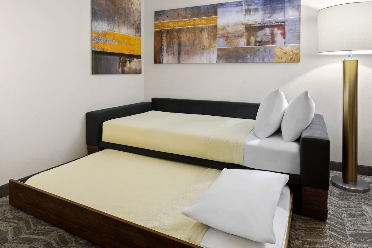 premium bedding, desk, blackout curtains, iron/ironing board