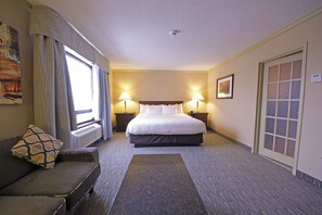 Suite, 1 King Bed, Non Smoking, Jetted Tub | Desk, blackout drapes, iron/ironing board, free WiFi