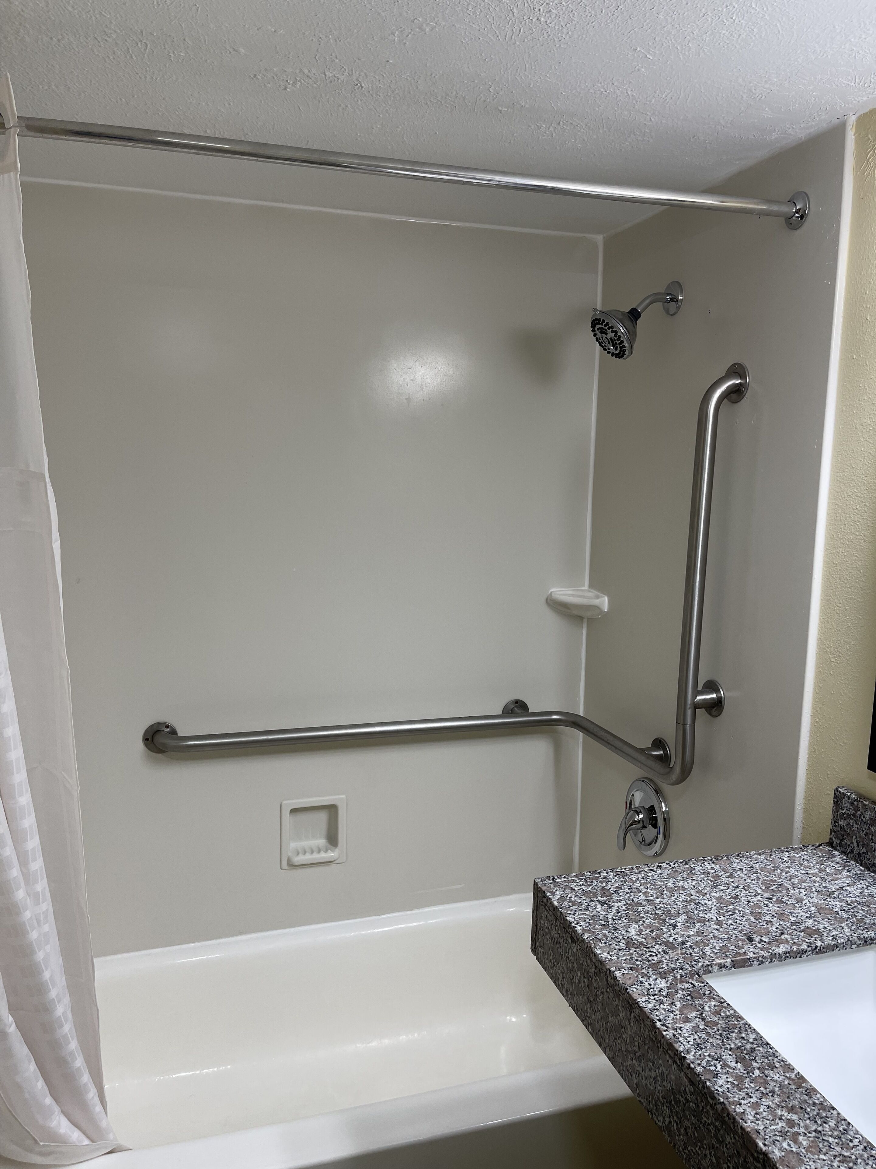 combined shower/bathtub, free toiletries, hair dryer, towels