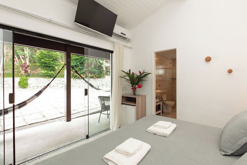 Standard Double Room, 1 King Bed | Minibar, in-room safe, individually decorated, desk