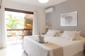 Standard Room, Pool View | 1 bedroom, minibar, in-room safe, individually decorated