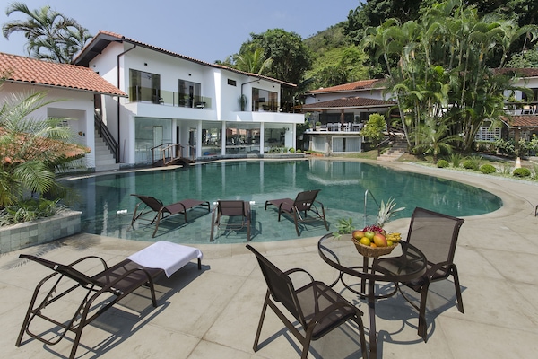 Outdoor pool, pool umbrellas, sun loungers