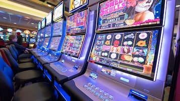 Experience the excitement of gaming with our slot machines, featuring a variety of options and denominations.