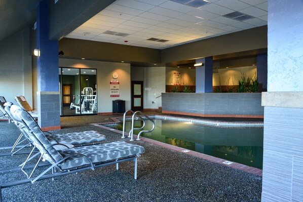 Relax by the pool, where a lifeguard is always on duty.