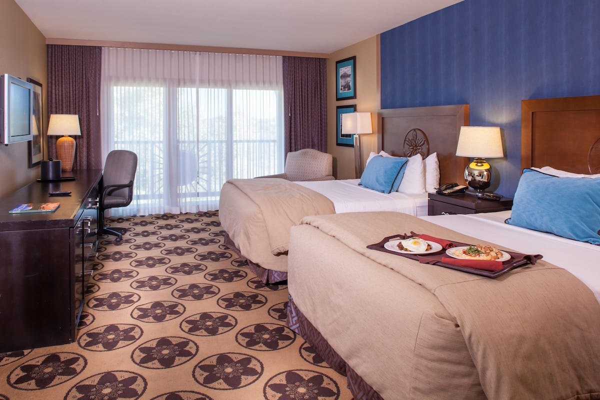 Premium bedding, down comforters, in-room safe, desk