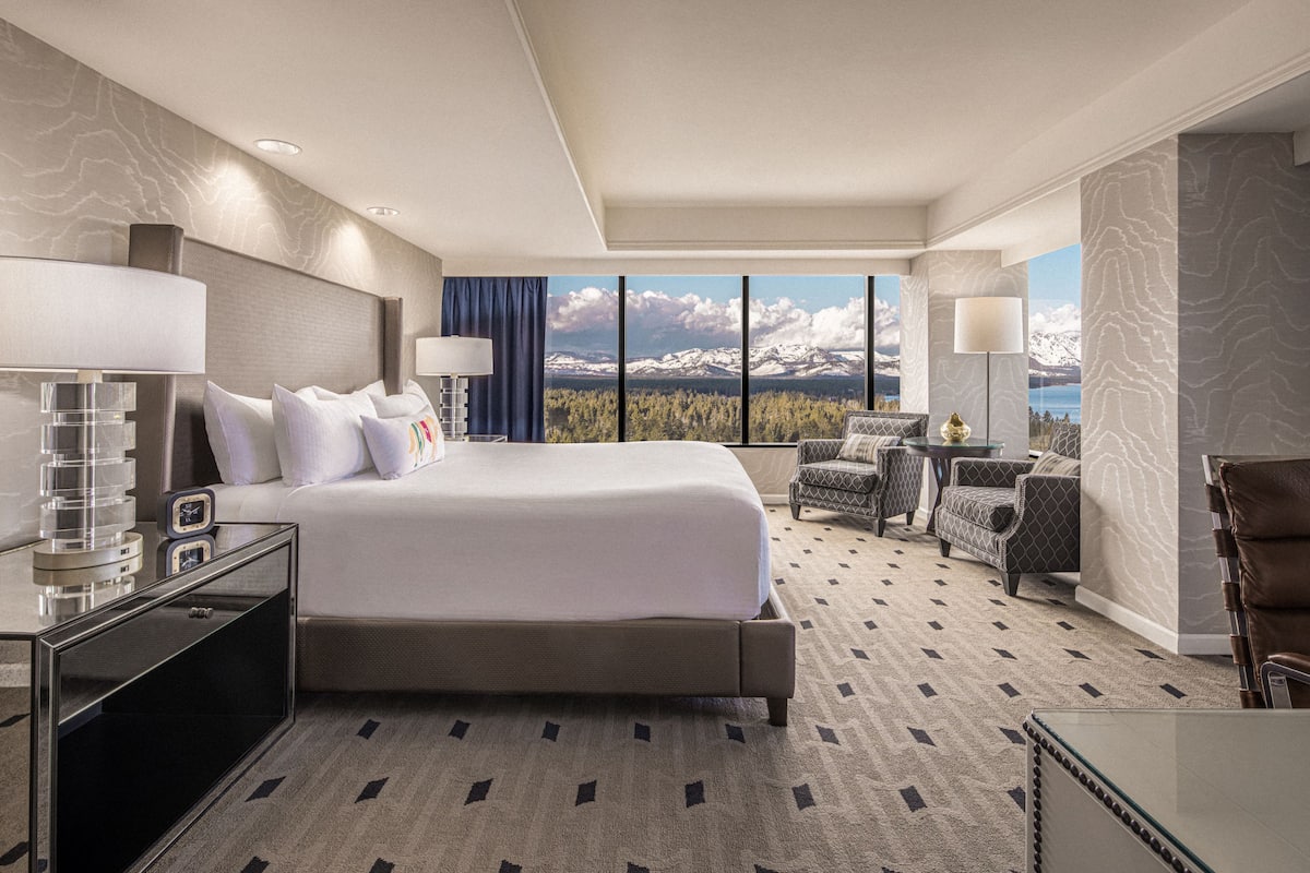 Premium bedding, desk, laptop workspace, blackout curtains