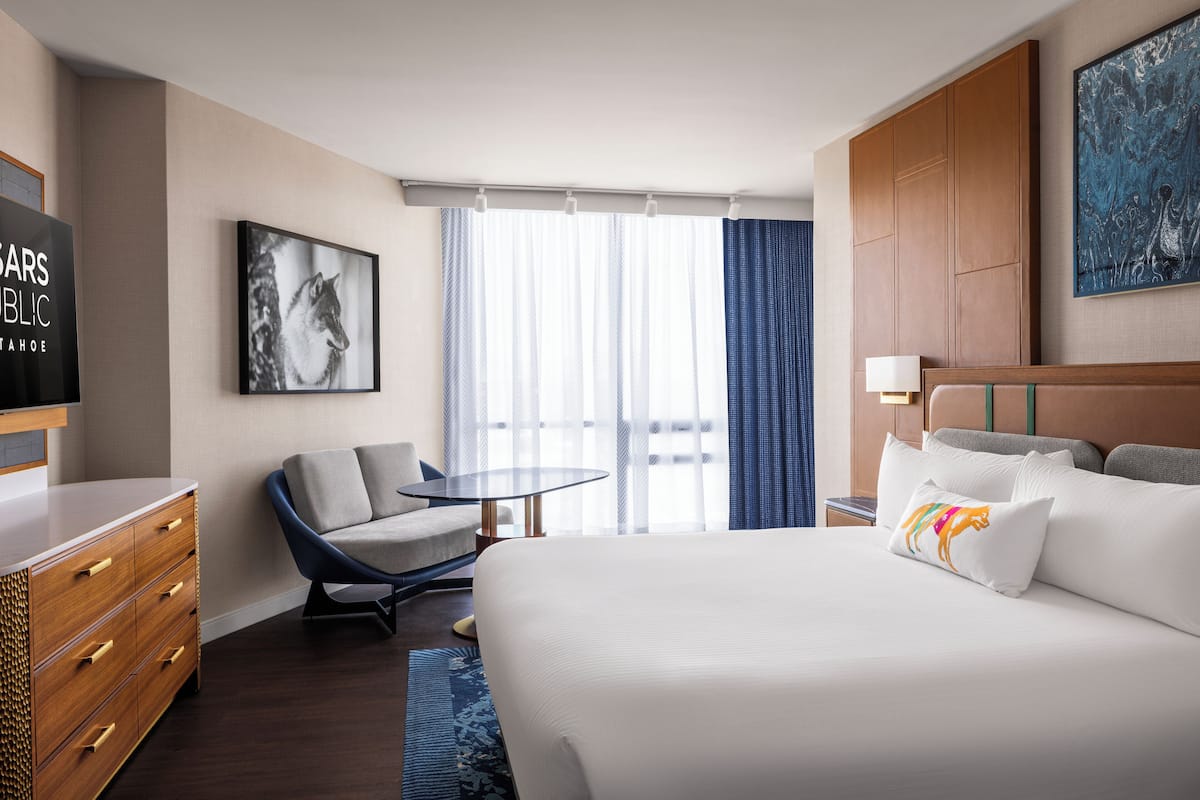 Premium bedding, desk, laptop workspace, blackout curtains