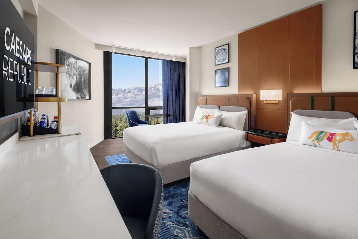 Premium bedding, desk, laptop workspace, blackout curtains