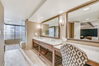 Balcony Suite King Non-Smoking | Bathroom | Free toiletries, hair dryer, towels at Harveys Lake Tahoe Resort & Casino
