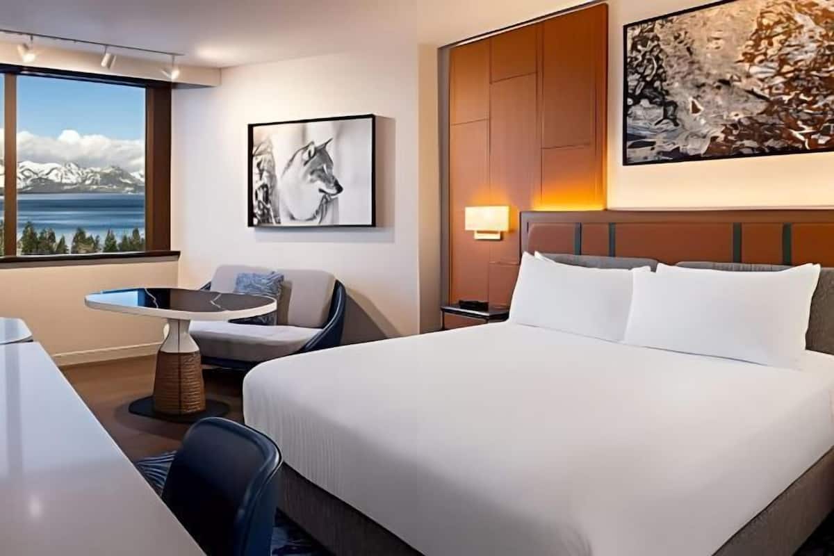 Premium bedding, desk, laptop workspace, blackout curtains