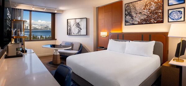Premium bedding, desk, laptop workspace, blackout curtains