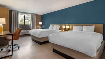 Pillowtop beds, desk, laptop workspace, blackout drapes