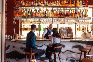 2 bars/lounges, rooftop bar