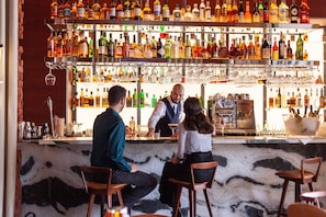 2 bars/lounges, rooftop bar