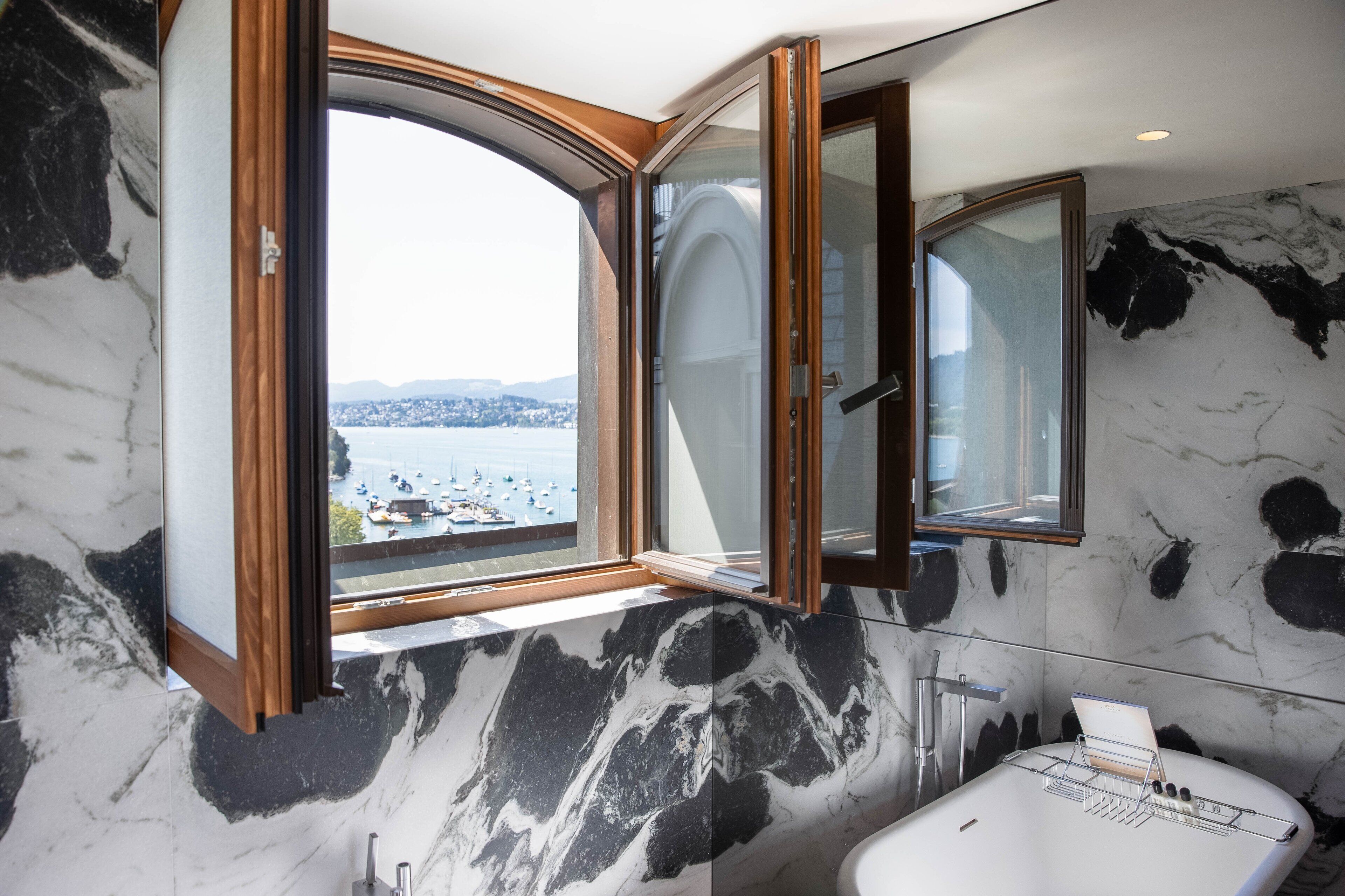 suite, lake view | bathroom | free toiletries, hair dryer, bathrobes, slippers